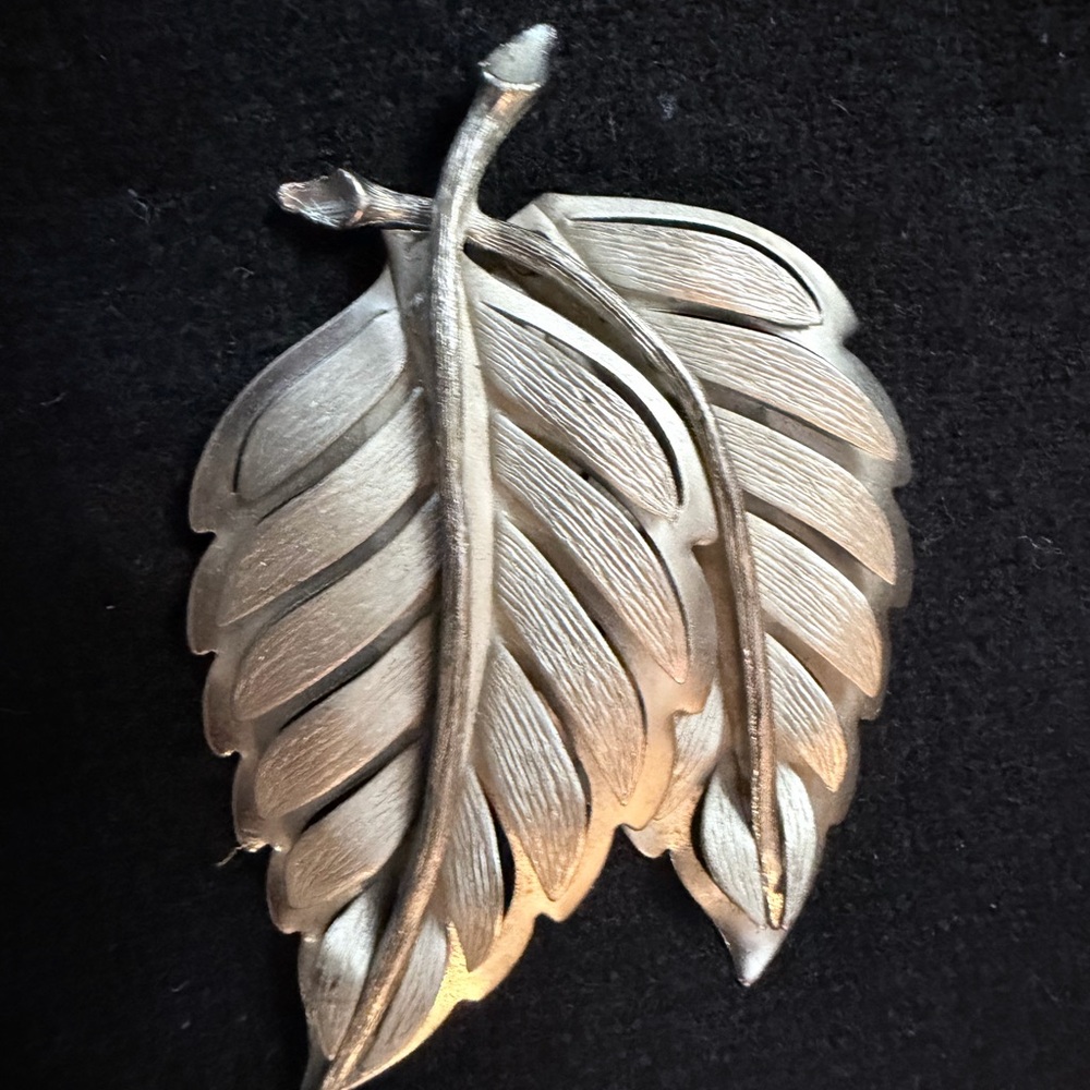 Silver toned vintage brooch.